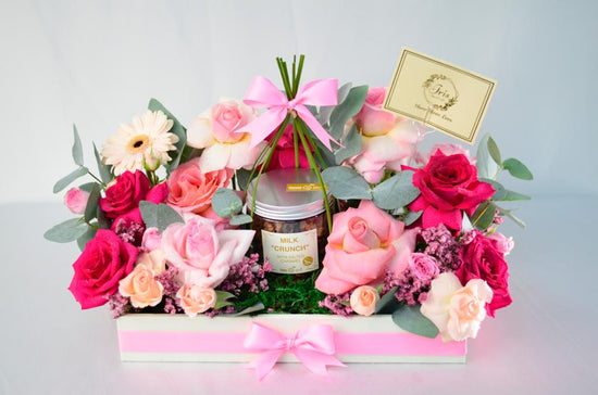 Pink flowers tray with chocolate