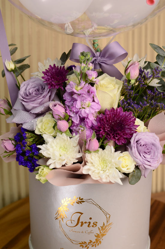 pink flowers with balloons