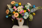 Blue and yellow flowers vase