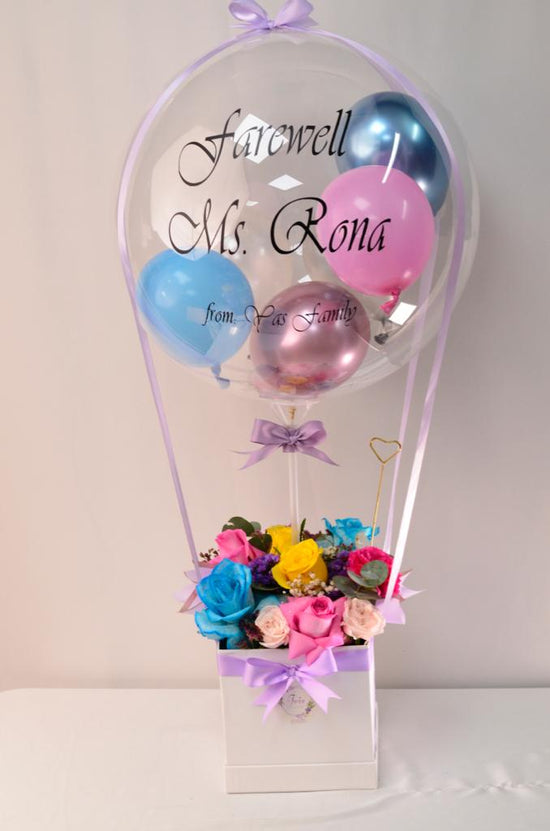 Blue ,yellow and pink flowers with balloons