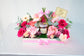 Pink flowers tray with chocolate