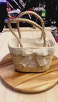 Pink and white flowers in hand bag