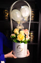 Yellow and Orange flowers with balloon in box