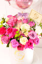 Pink flowers box with balloons
