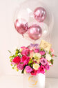Pink flowers box with balloons