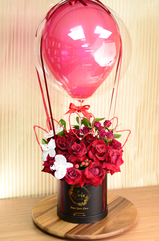 Red rose with balloons box