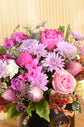 Pink artificial and fresh flowers box