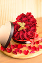 red rose in heart box